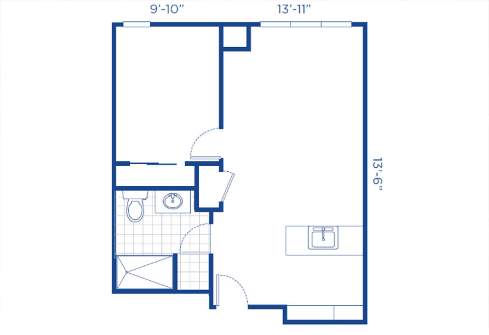A simple floor plan shows a large main room with a kitchen area, a smaller bathroom with a toilet, sink, and shower, and entry doors. Room dimensions are labeled as 9’-10”, 13’-11”, and 13’-6”.