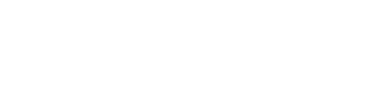 White logo for "The Lodge Assisted Living & Memory Care" on a light gray background, with a circular emblem containing a "W" to the left of the text.