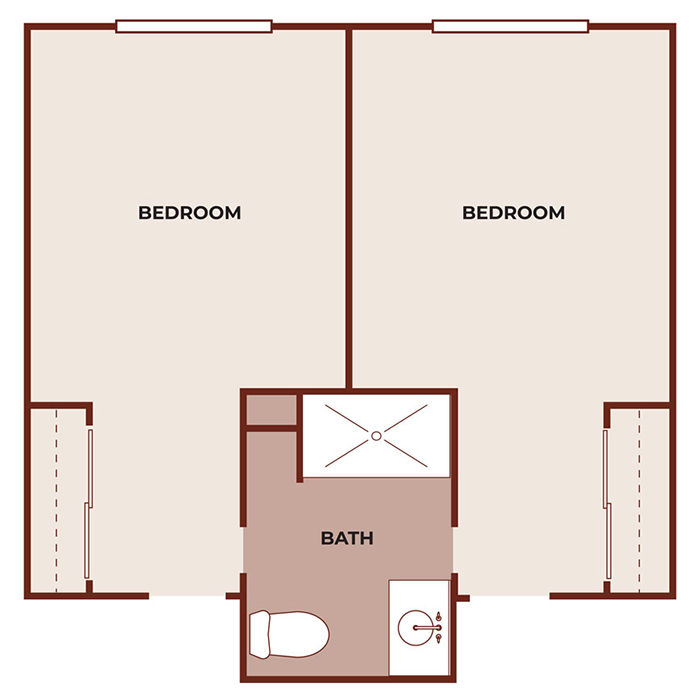 Floor plan showing two adjacent bedrooms, each with a closet, and a shared bathroom in the center. The bathroom includes a toilet, sink, and shower, with doors connecting to both bedrooms.